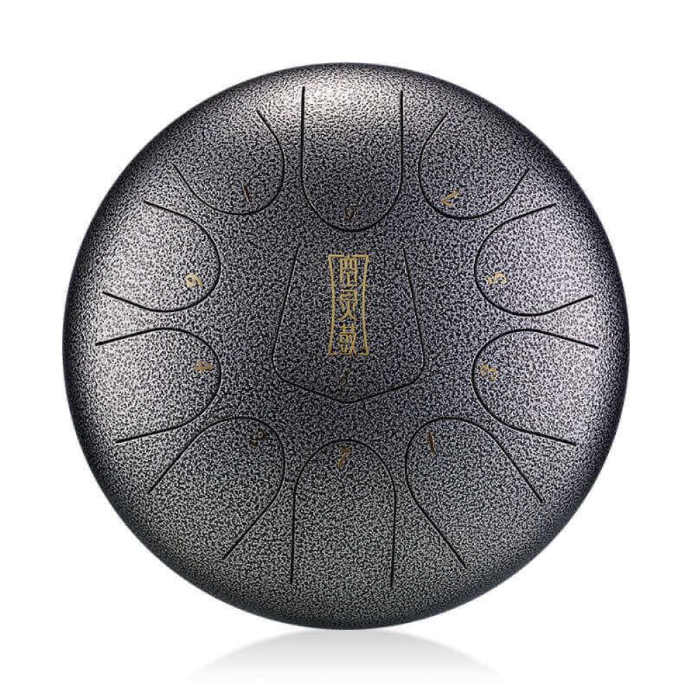 Metallic steel tongue drum with etched segments in a circular pattern, 10 Inch D Key