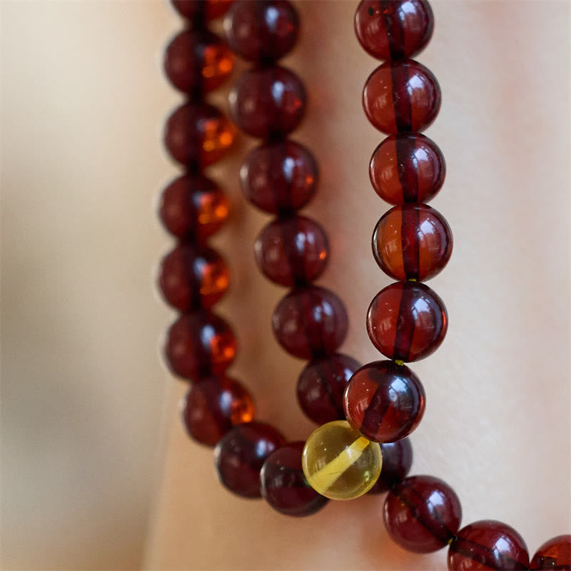Bracelet Mala en ambre de 108 perles pour soulager l'anxiété et l'équilibre