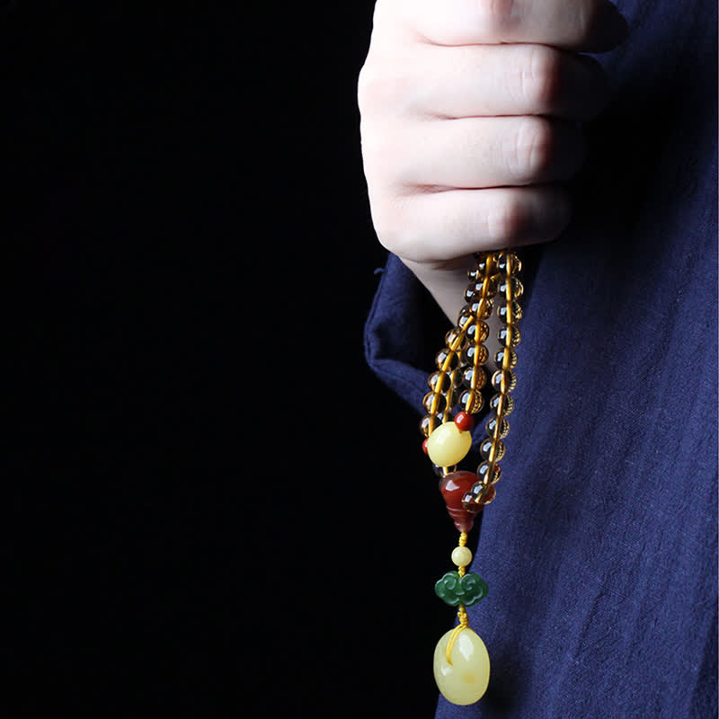 Bracelet Mala 108 perles en citrine et ambre pour la paix