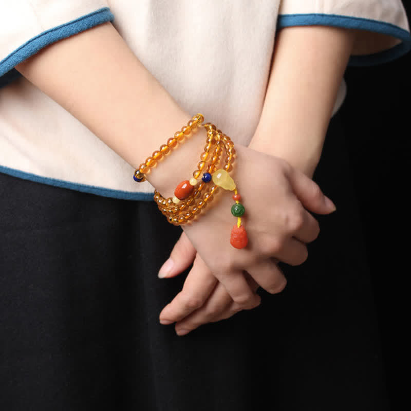 Bracelet Mala 108 perles en citrine et ambre pour la paix