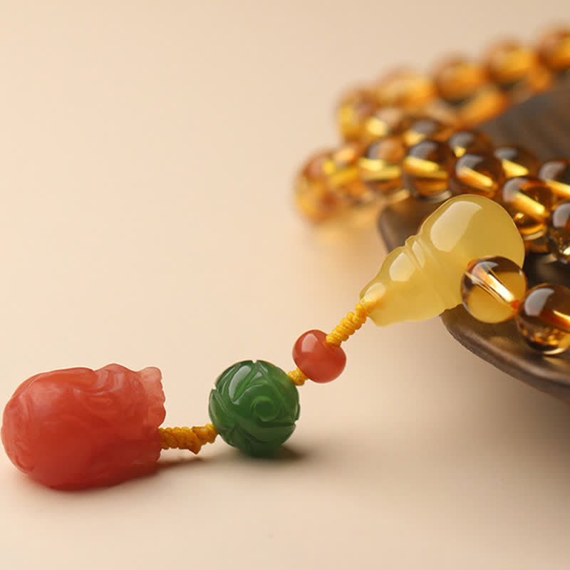 Bracelet Mala 108 perles en citrine et ambre pour la paix