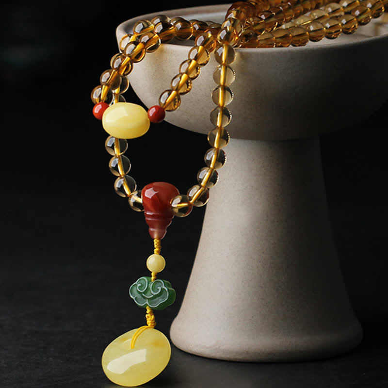 Bracelet Mala 108 perles en citrine et ambre pour la paix