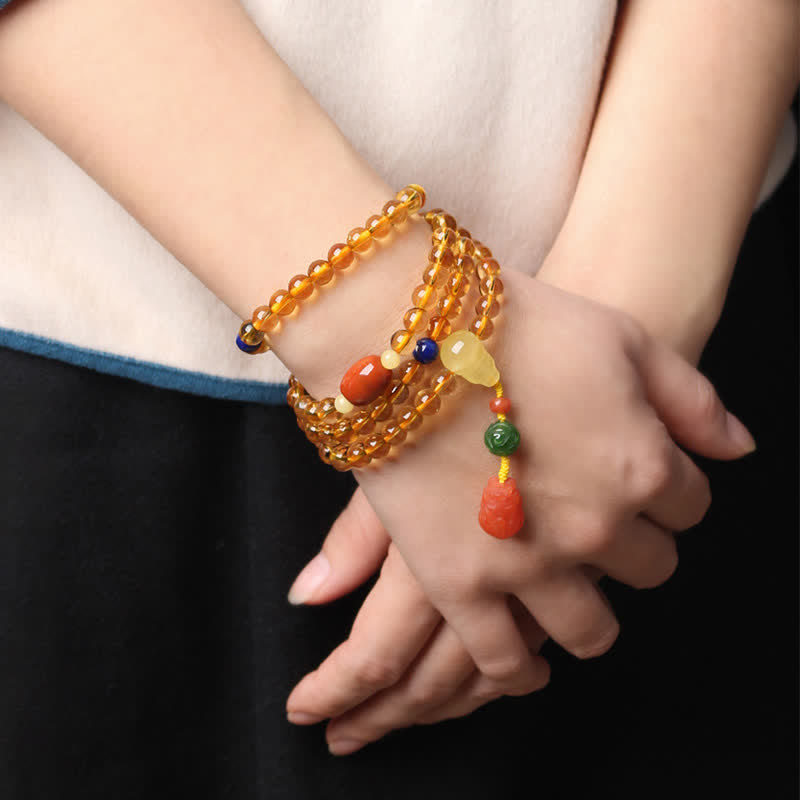 Bracelet Mala 108 perles en citrine et ambre pour la paix