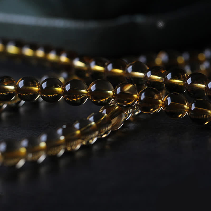 Bracelet Mala 108 perles en citrine et ambre pour la paix