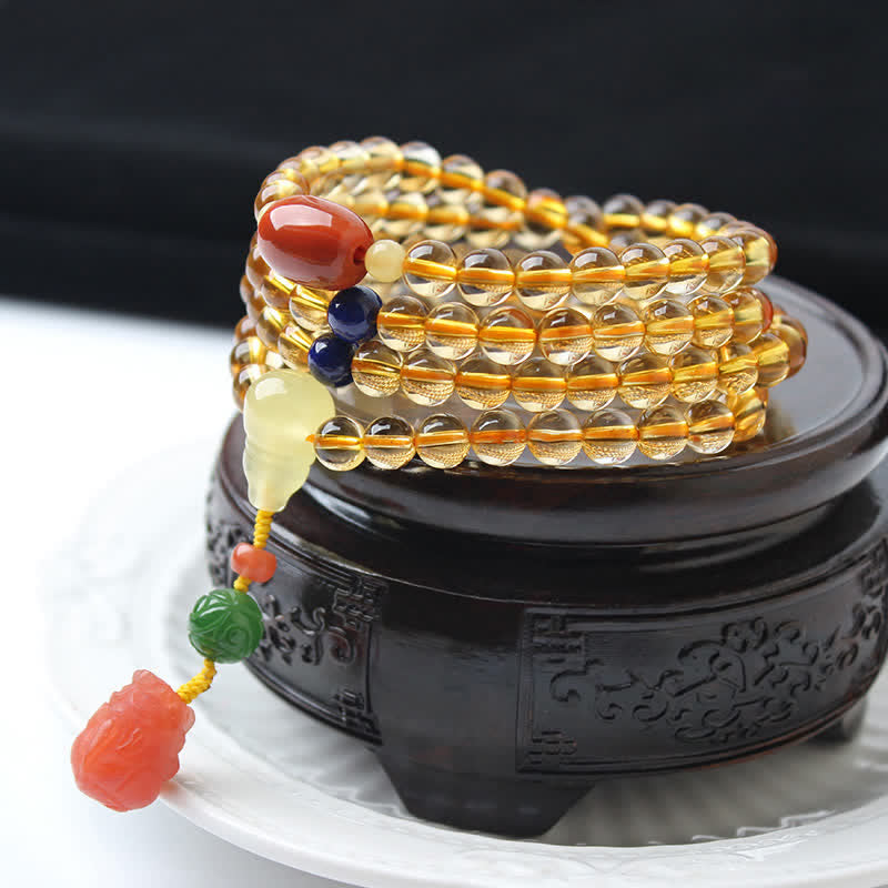 Bracelet Mala 108 perles en citrine et ambre pour la paix