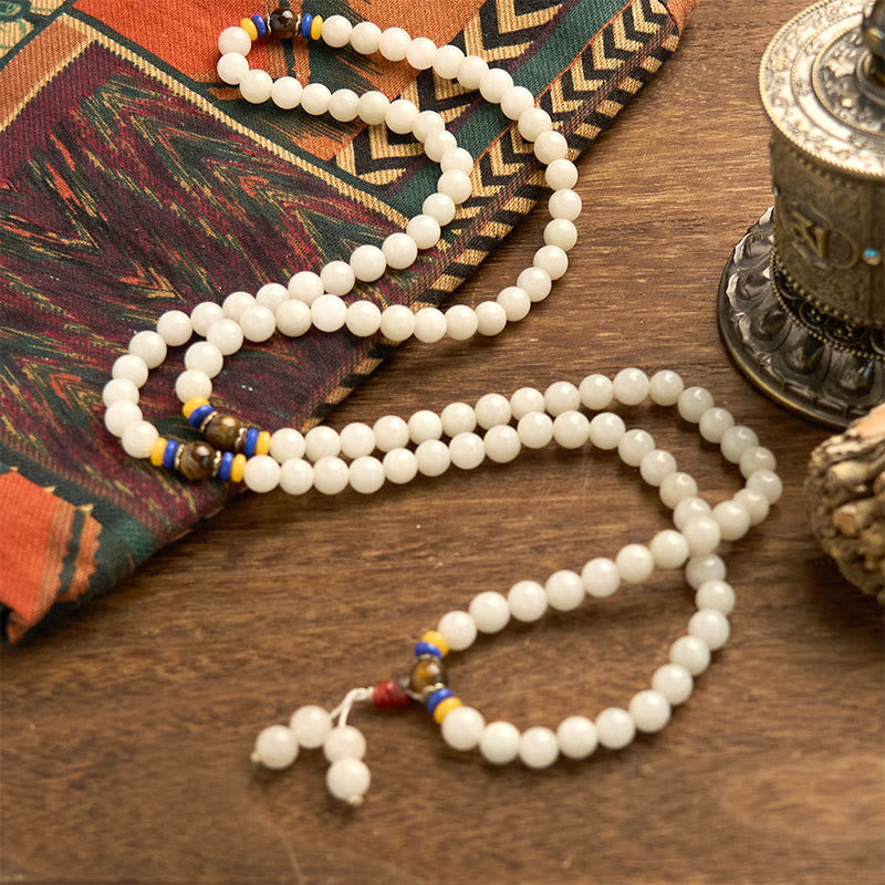 Bracelet Mala en jade et soie dorée à 108 perles pour la richesse et la chance