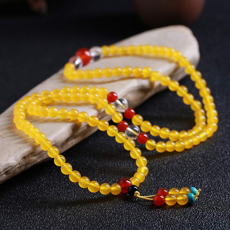 Bracelet Mala 108 perles en calcédoine jaune pour l'harmonie et la positivité