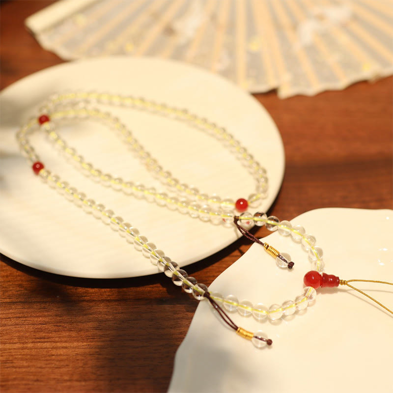 Bracelet de protection quadruple tour en agate blanche et rouge à 108 perles