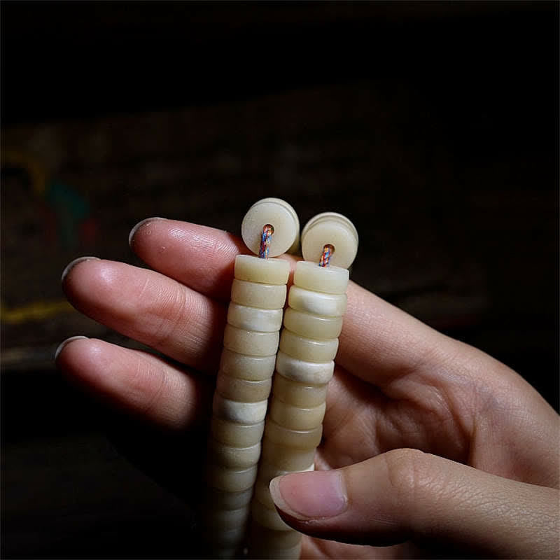 Bracelet Mala en os de yak à 108 perles pour la force et l'équilibre