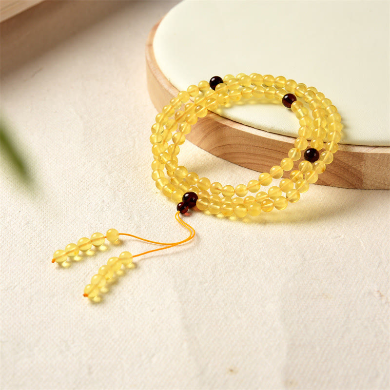 Bracelet Mala 108 perles en ambre pour soulager l'anxiété