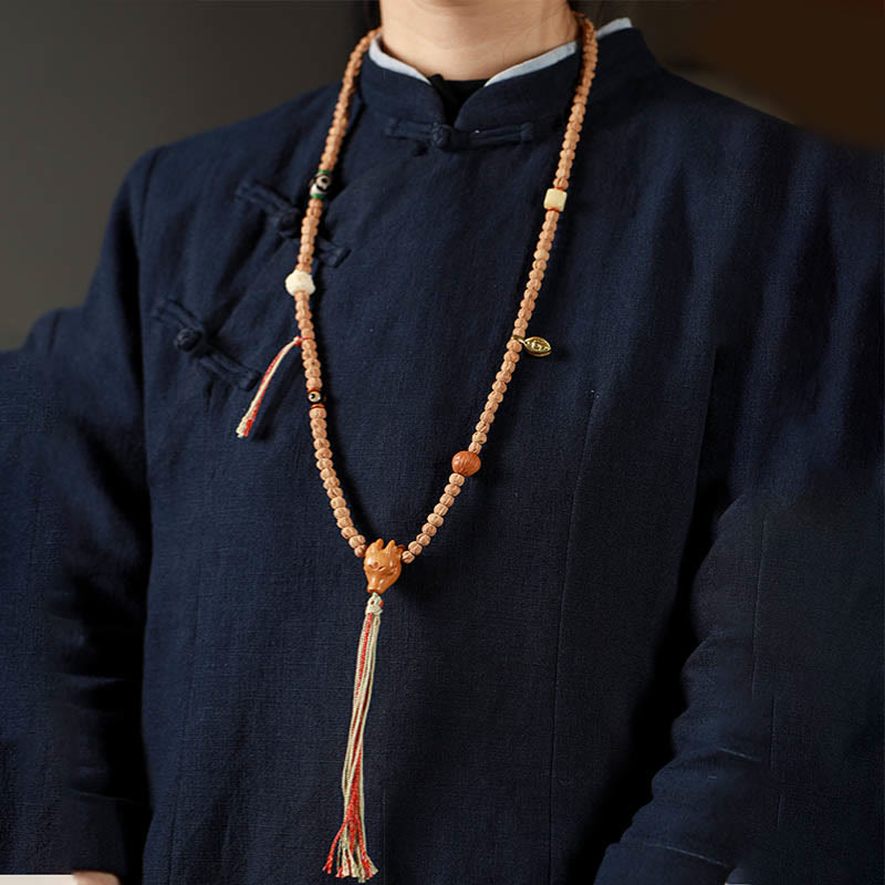 Bracelet Mala de Sagesse 108 Perles en Agate Rouge et Tête de Cerf