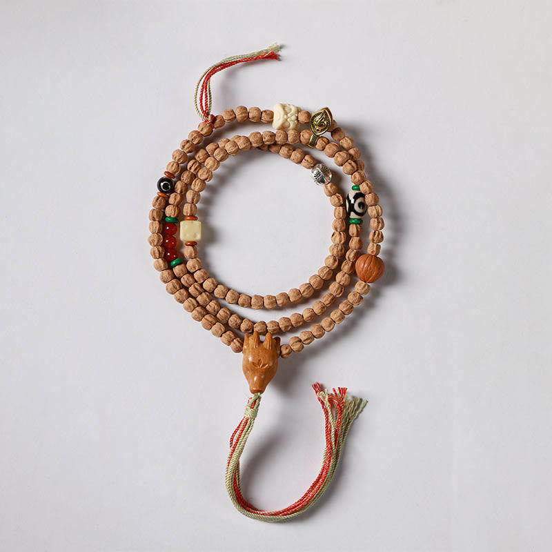 Bracelet Mala de Sagesse 108 Perles en Agate Rouge et Tête de Cerf