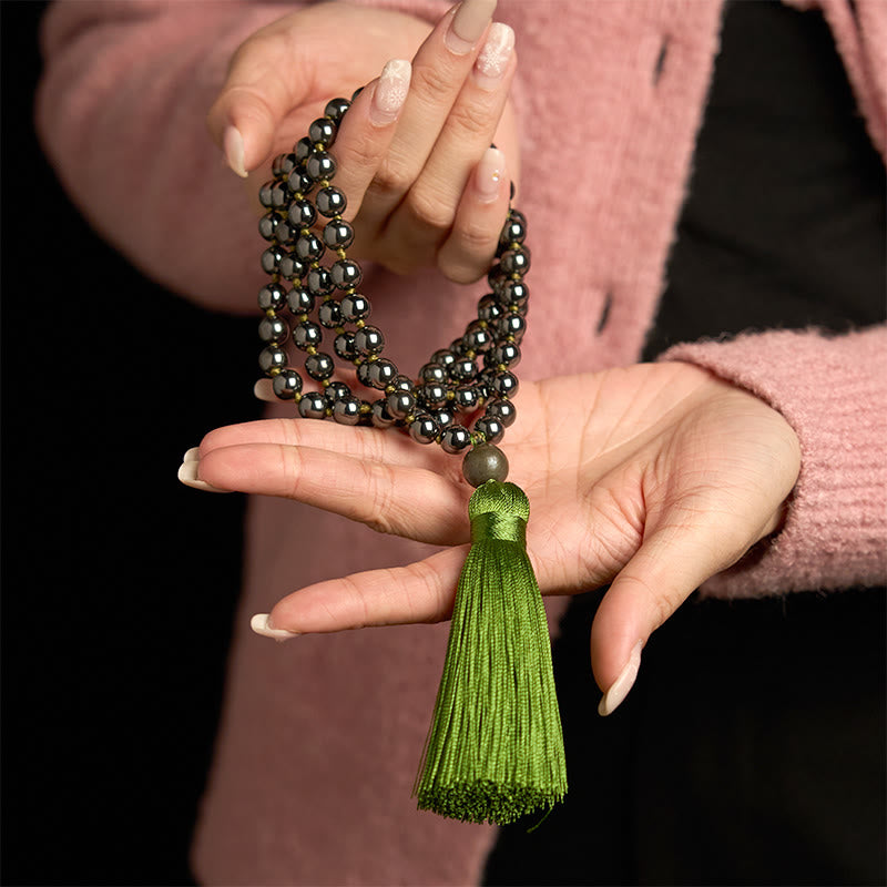 Bracelet de mise à la terre en hématite de 108 perles avec pompon vert