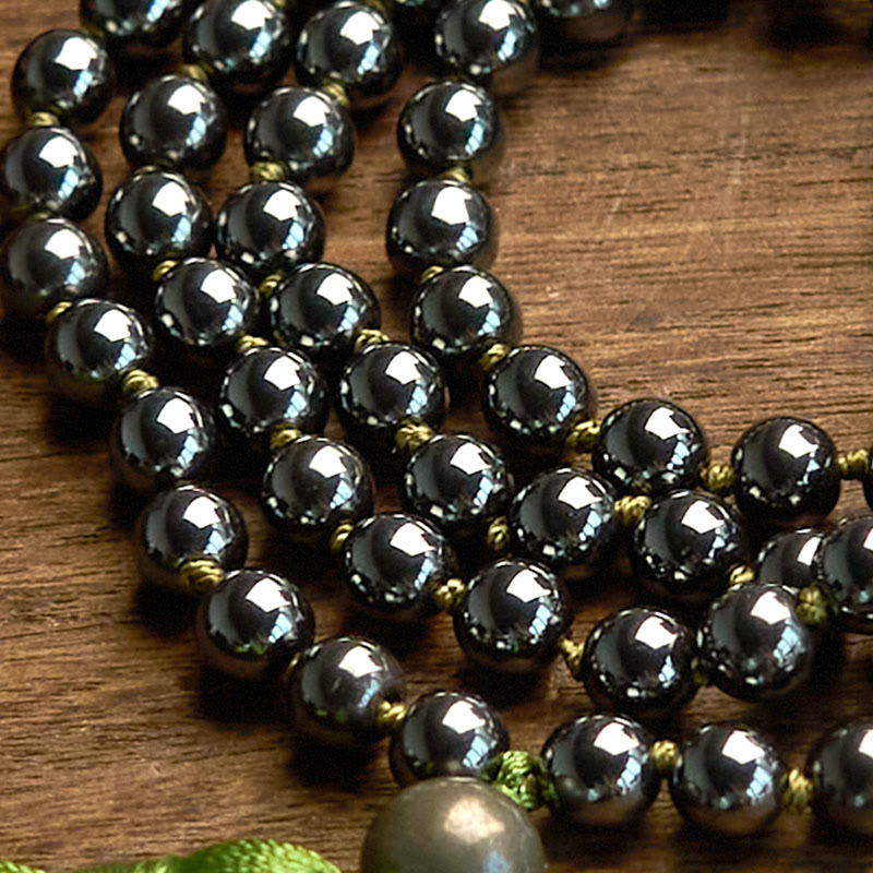 Bracelet de mise à la terre en hématite de 108 perles avec pompon vert