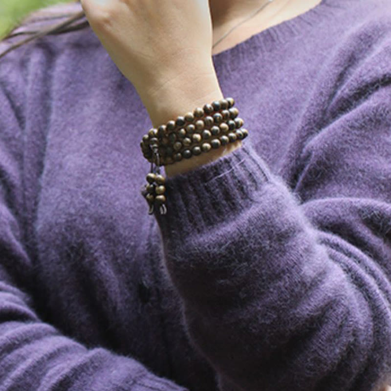 Bracelet Mala en bois d'agar Tarakan de 108 perles pour la protection