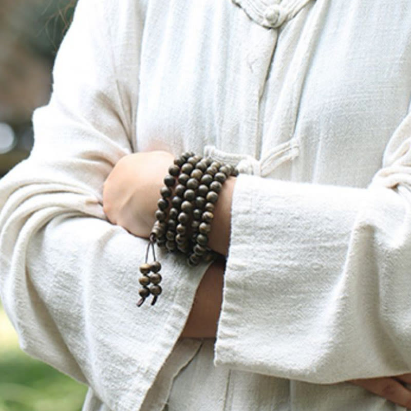 Bracelet Mala en bois d'agar Tarakan de 108 perles pour la protection
