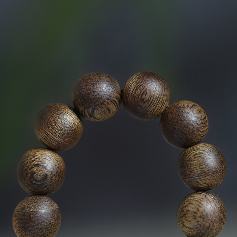 Bracelet Mala en bois d'agar 108 perles pour l'équilibre et la force