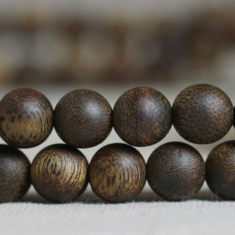 Bracelet Mala en bois d'agar 108 perles pour l'équilibre et la force