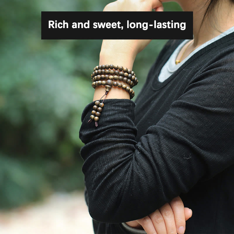 Bracelet Mala en bois d'agar 108 perles pour l'équilibre et la force