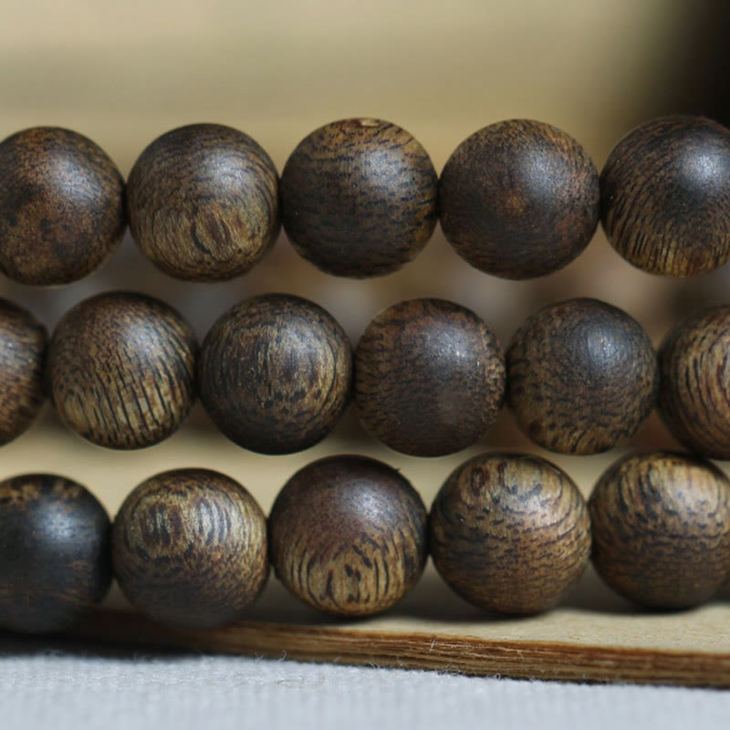 Bracelet Mala en bois d'agar 108 perles pour l'équilibre et la force