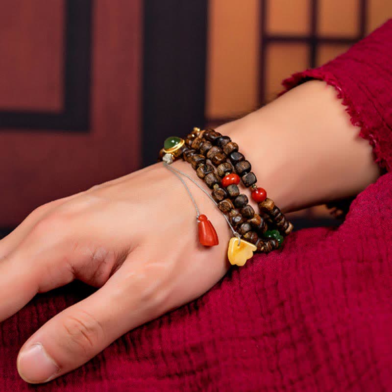 Bracelet Mala 108 perles en bois d'agar pour la paix et la force