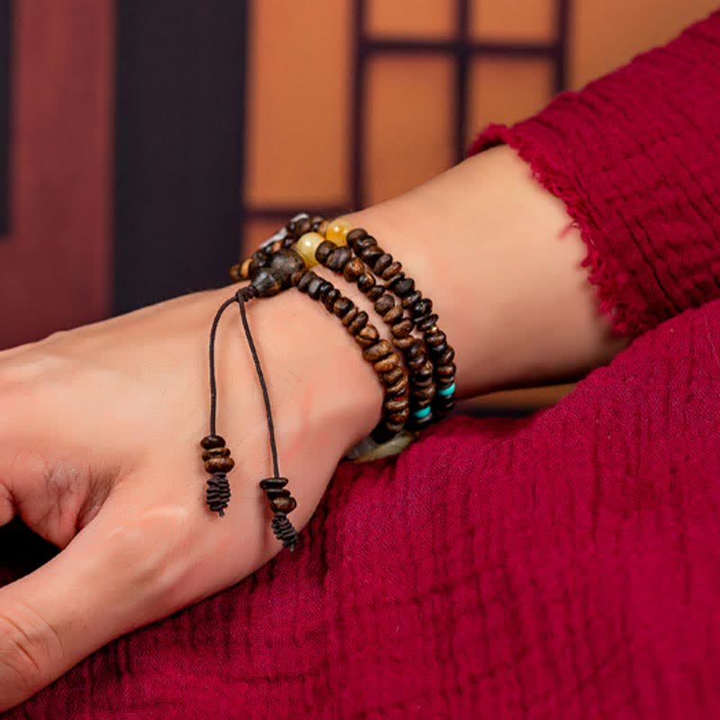 Bracelet Mala 108 perles en bois d'agar pour la paix et la force