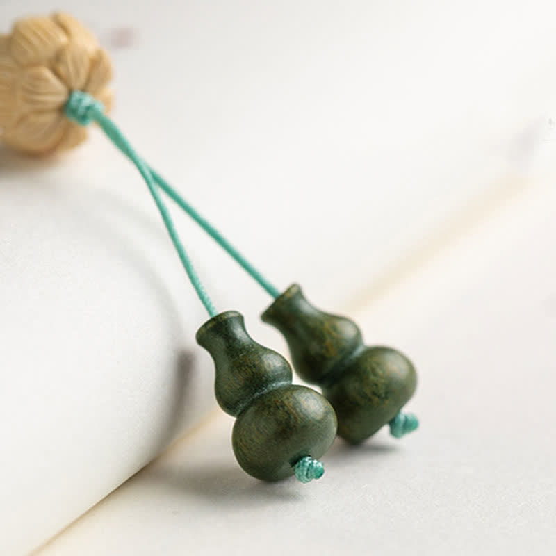 Bracelet Mala 108 perles en bois de santal vert et perles de lotus