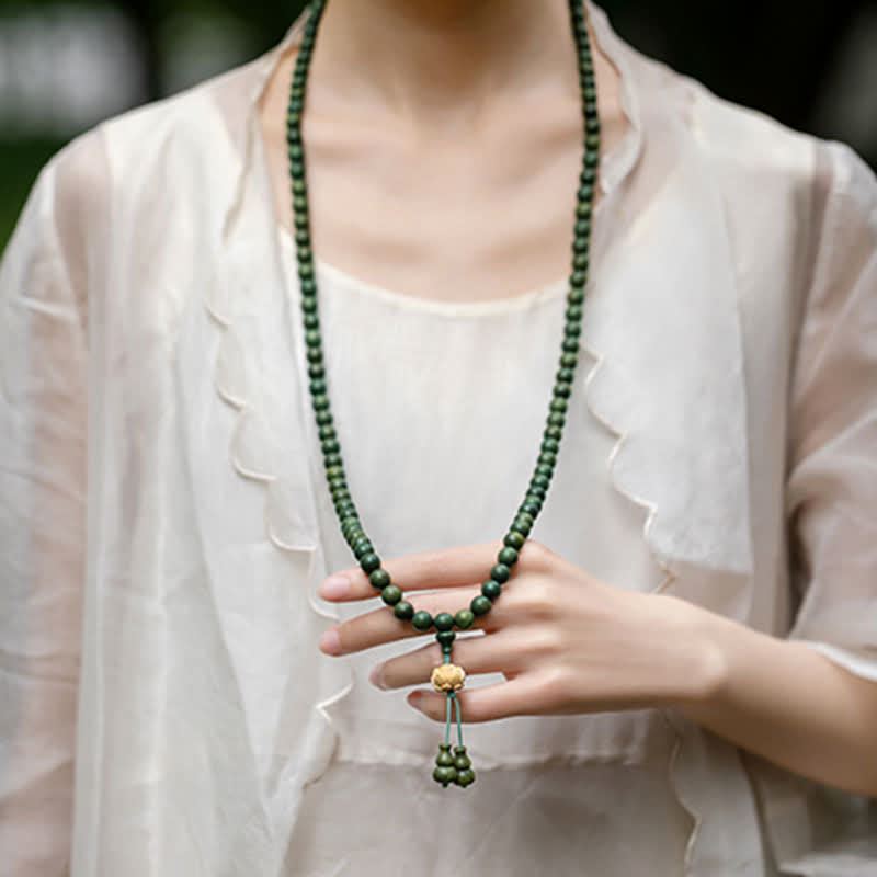 Bracelet Mala 108 perles en bois de santal vert et perles de lotus