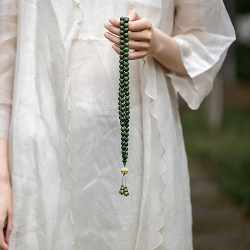 Bracelet Mala 108 perles en bois de santal vert et perles de lotus
