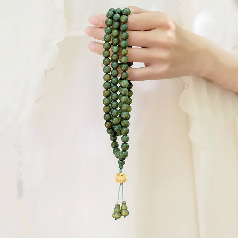 Bracelet Mala 108 perles en bois de santal vert et perles de lotus