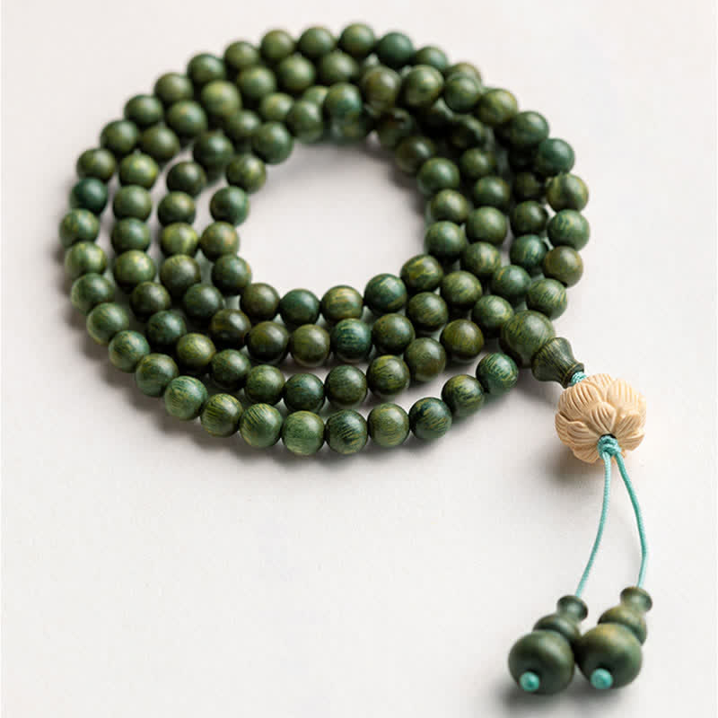 Bracelet Mala 108 perles en bois de santal vert et perles de lotus