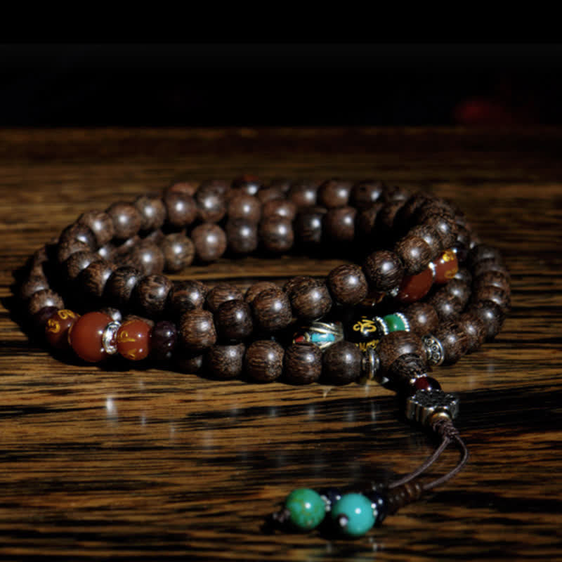 Bracelet Mala 108 en bois d'agar et d'agate rouge pour la paix et la force