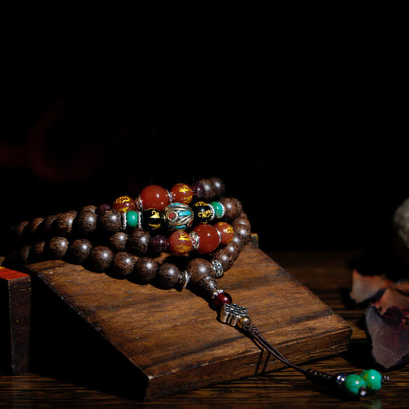 Bracelet Mala 108 en bois d'agar et d'agate rouge pour la paix et la force