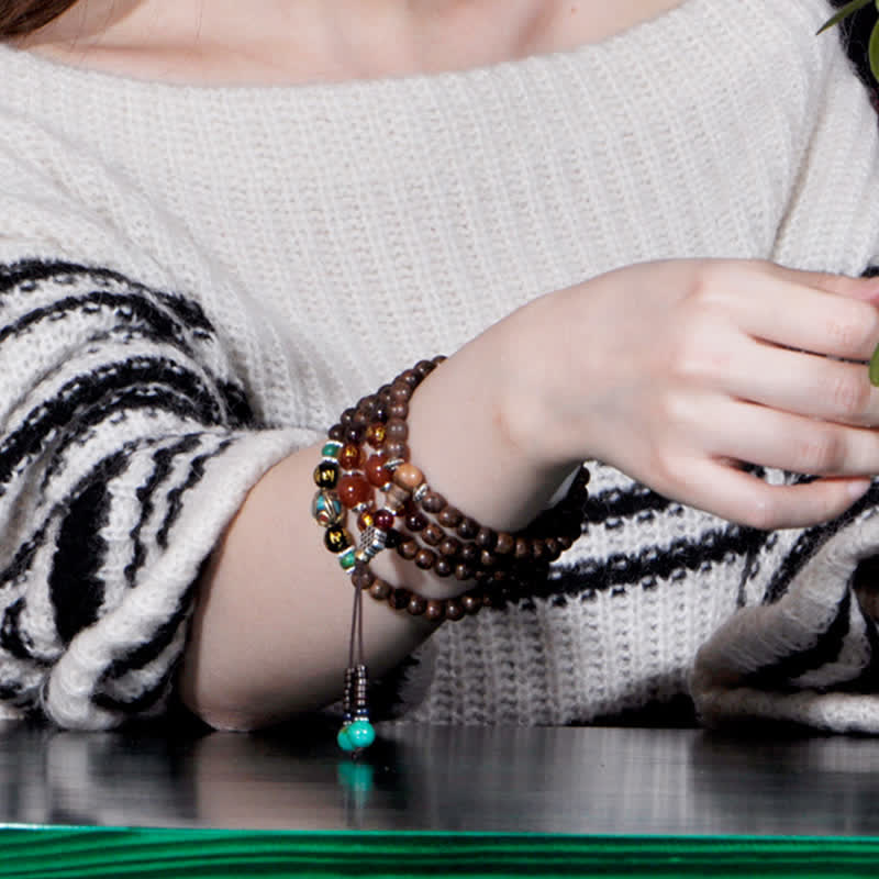 Bracelet Mala 108 en bois d'agar et d'agate rouge pour la paix et la force
