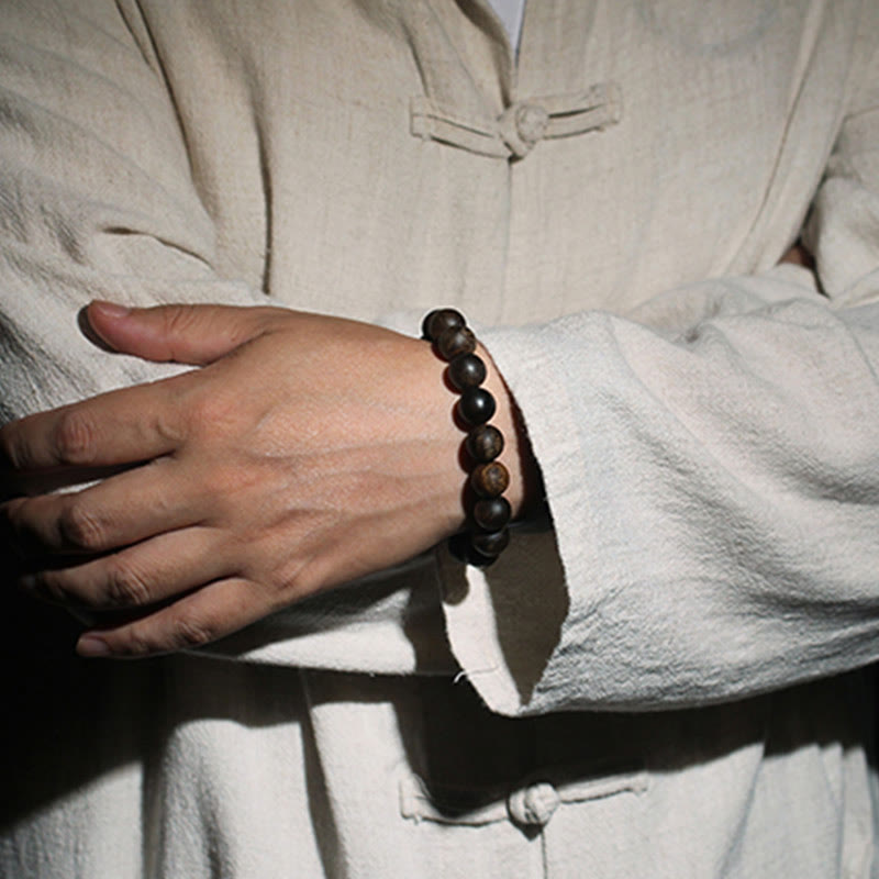 Bracelet de paix en bois d'agar de Brunei de 10 mm avec ondulations d'eau