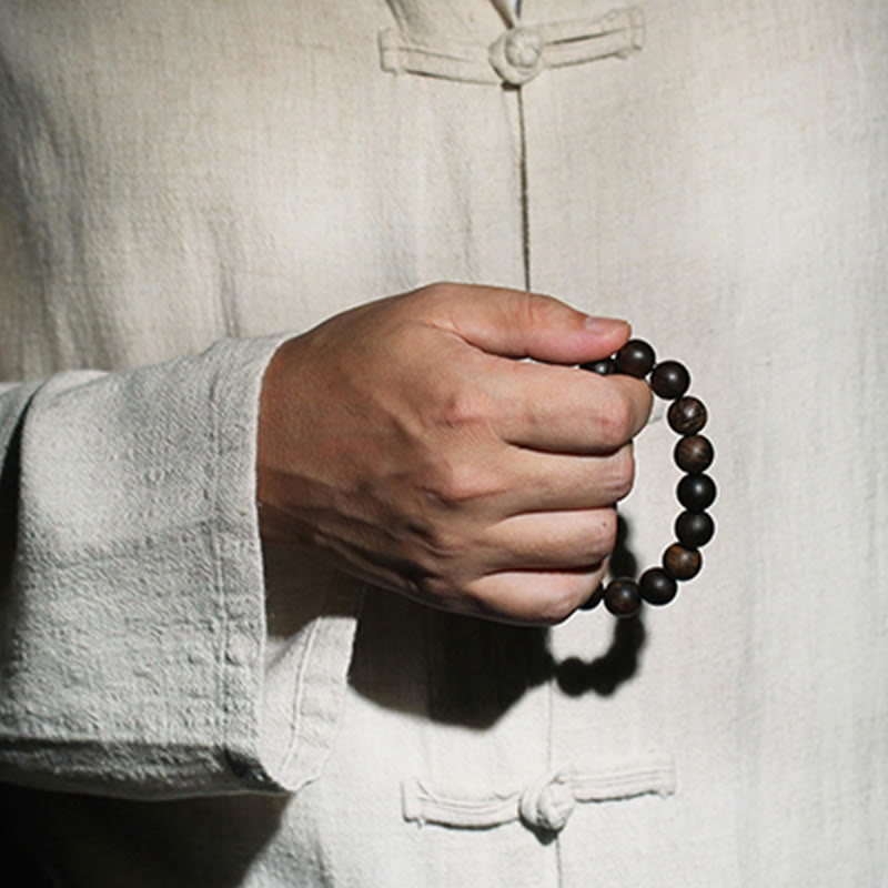 Bracelet de paix en bois d'agar de Brunei de 10 mm avec ondulations d'eau