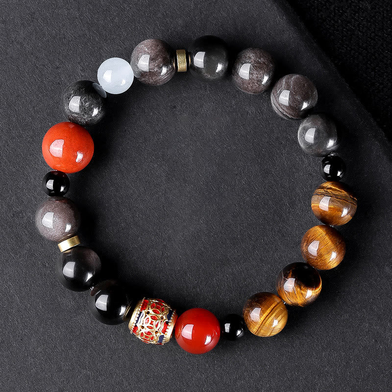 Bracelet Om Mani Padme Hum en obsidienne œil de tigre argenté brillant de 10 mm