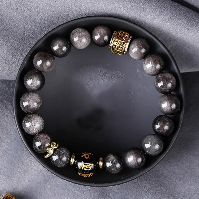 Bracelet Om Mani Padme Hum en obsidienne œil de tigre argenté brillant de 10 mm