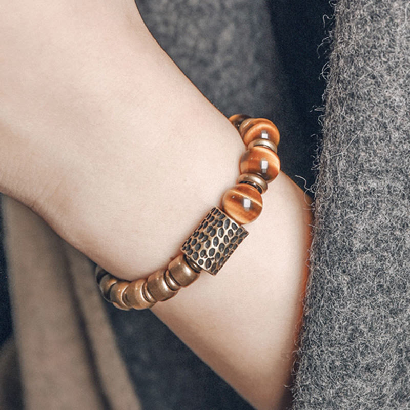 Bracelet de protection œil de tigre 10 mm avec accents cuivrés