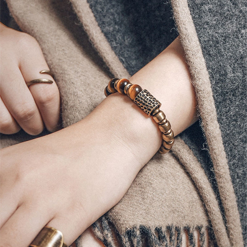 Bracelet de protection œil de tigre 10 mm avec accents cuivrés