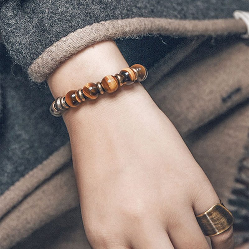 Bracelet de protection œil de tigre 10 mm avec accents cuivrés