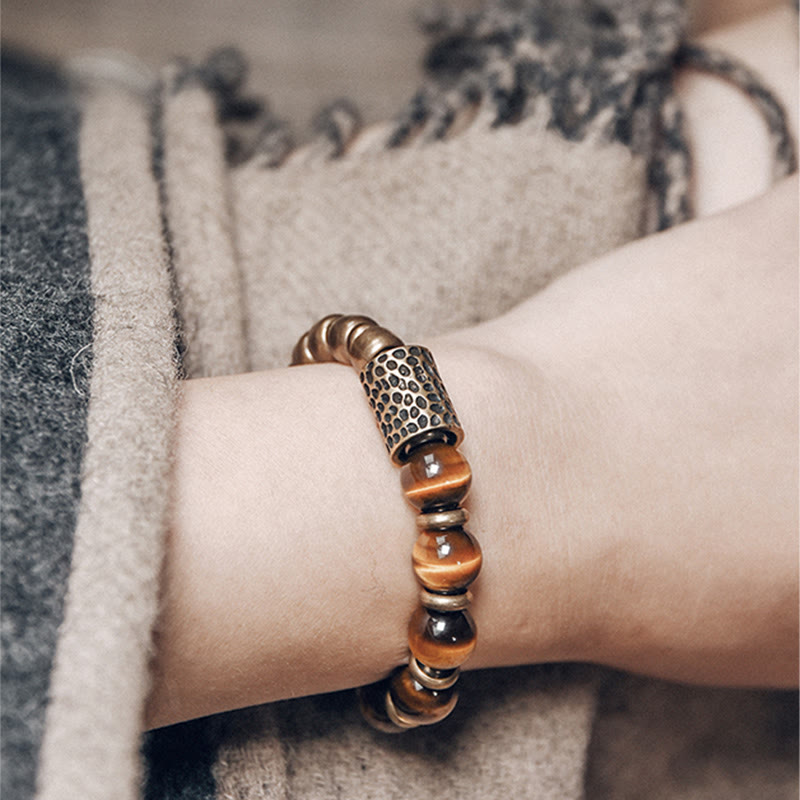 Bracelet de protection œil de tigre 10 mm avec accents cuivrés