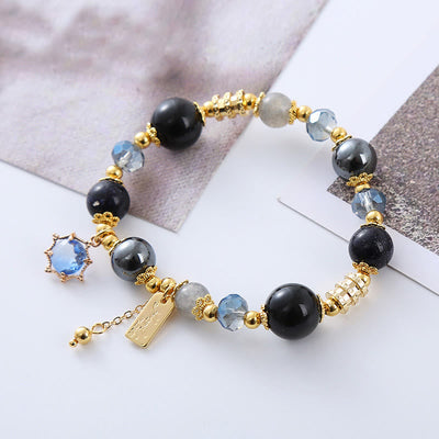 Bracelet de force en obsidienne noire et hématite de 12 mm pour femme