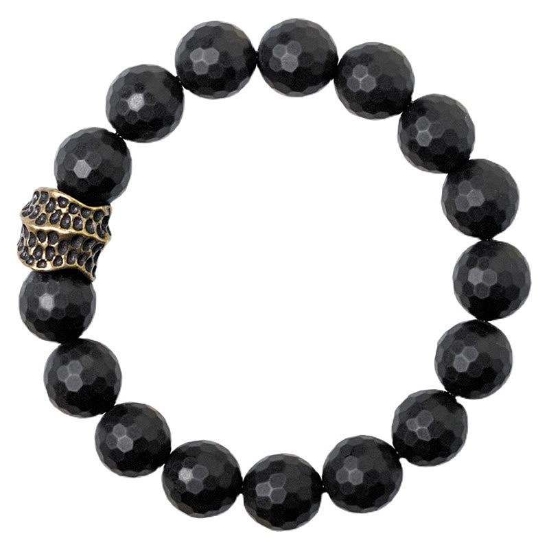 Bracelet de protection en onyx noir 12 mm avec accents cuivrés | Sons de guérison