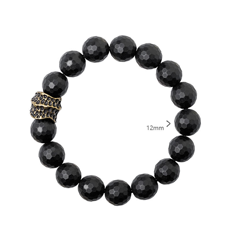 Bracelet de protection en onyx noir 12 mm avec accents cuivrés | Sons de guérison