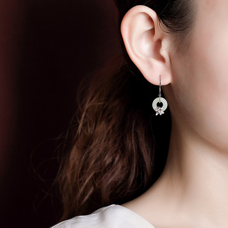 Boucles d'oreilles en jade Hetian 12 mm avec boucle de paix et jade orchidée