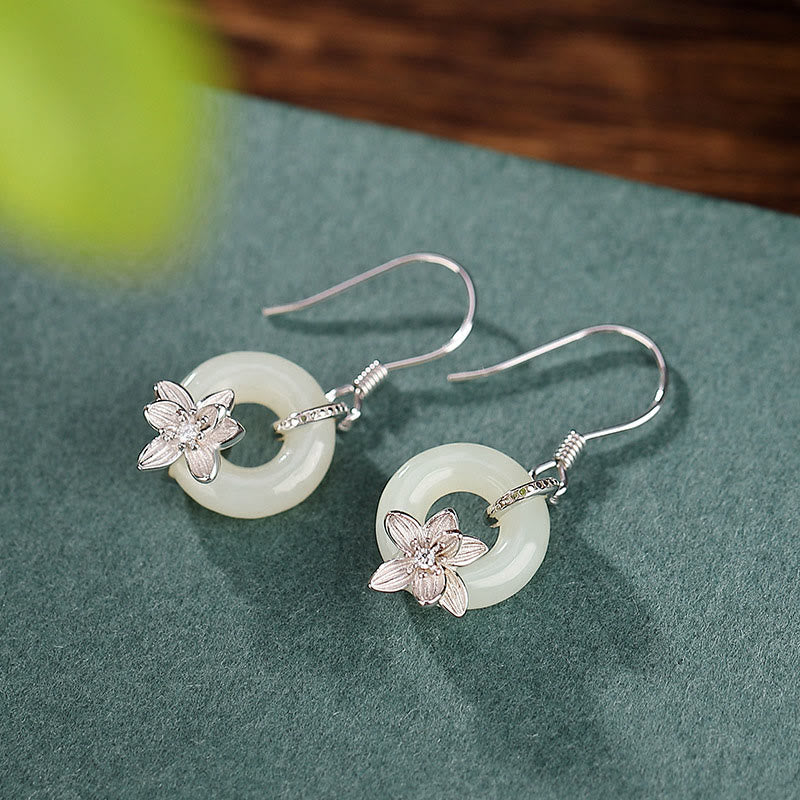 Boucles d'oreilles en jade Hetian 12 mm avec boucle de paix et jade orchidée
