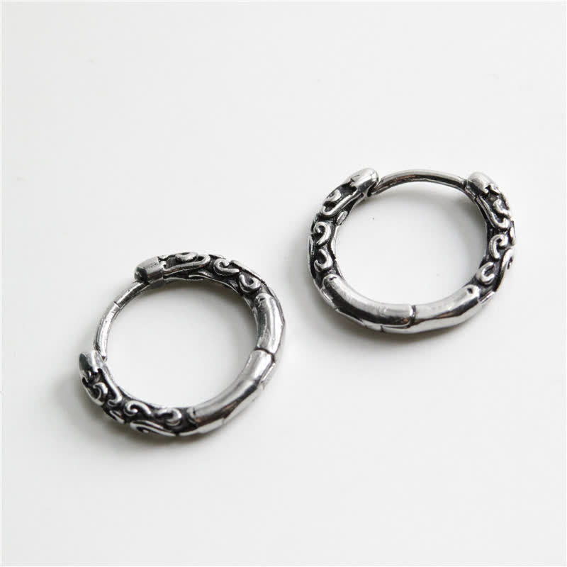 Boucles d'oreilles créoles en acier titane de 12 mm pour un calme spirituel