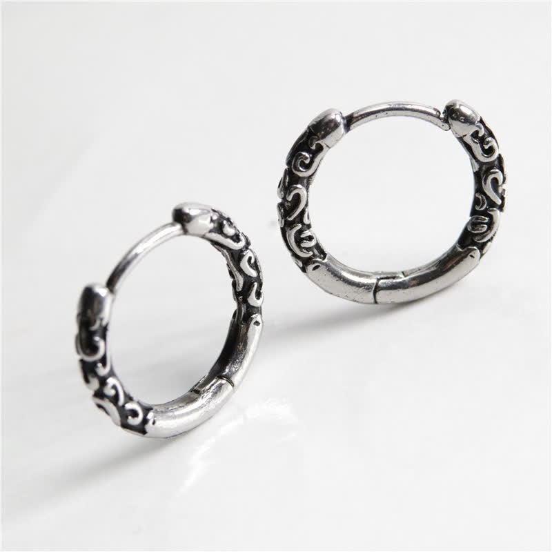 Boucles d'oreilles créoles en acier titane de 12 mm pour un calme spirituel