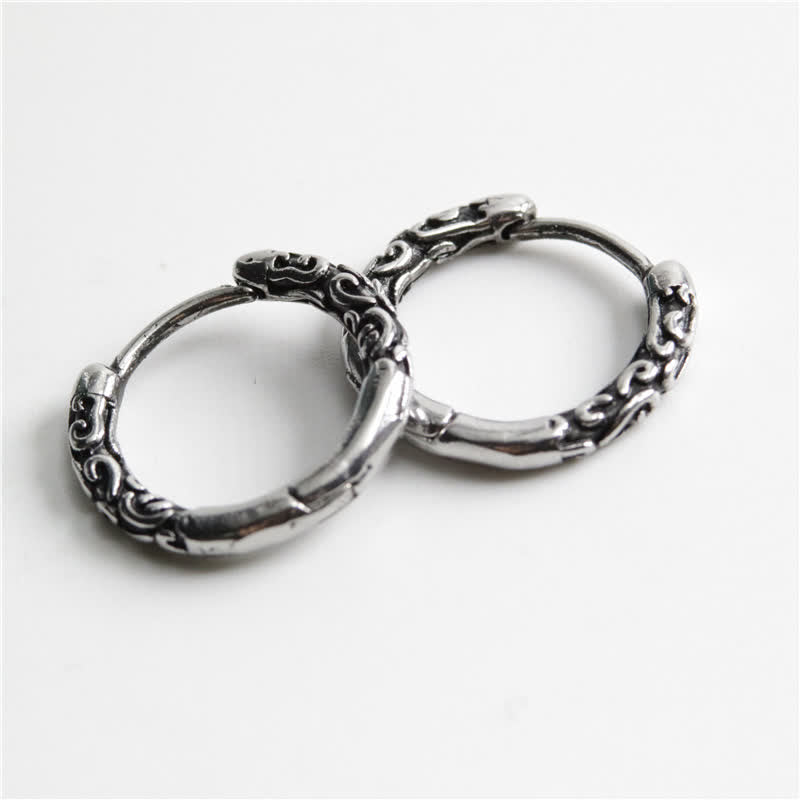 Boucles d'oreilles créoles en acier titane de 12 mm pour un calme spirituel